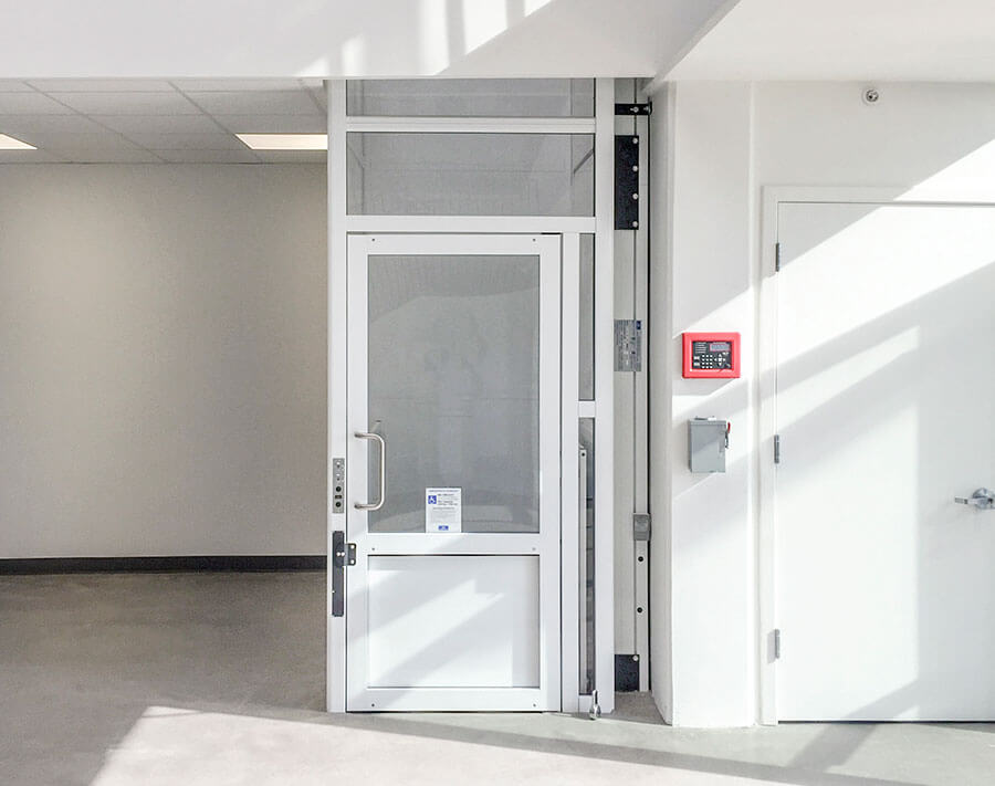 Genesis Enclosure Vertical Platform Lift. Residential and commercial lift solutions in DFW, Texas.