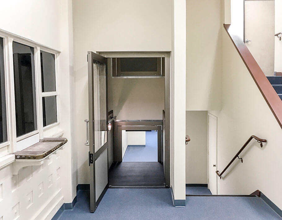 Genesis Shaftway Vertical Platform Lift entry. Commercial lift and accessibility for multi-level buildings. DFW.