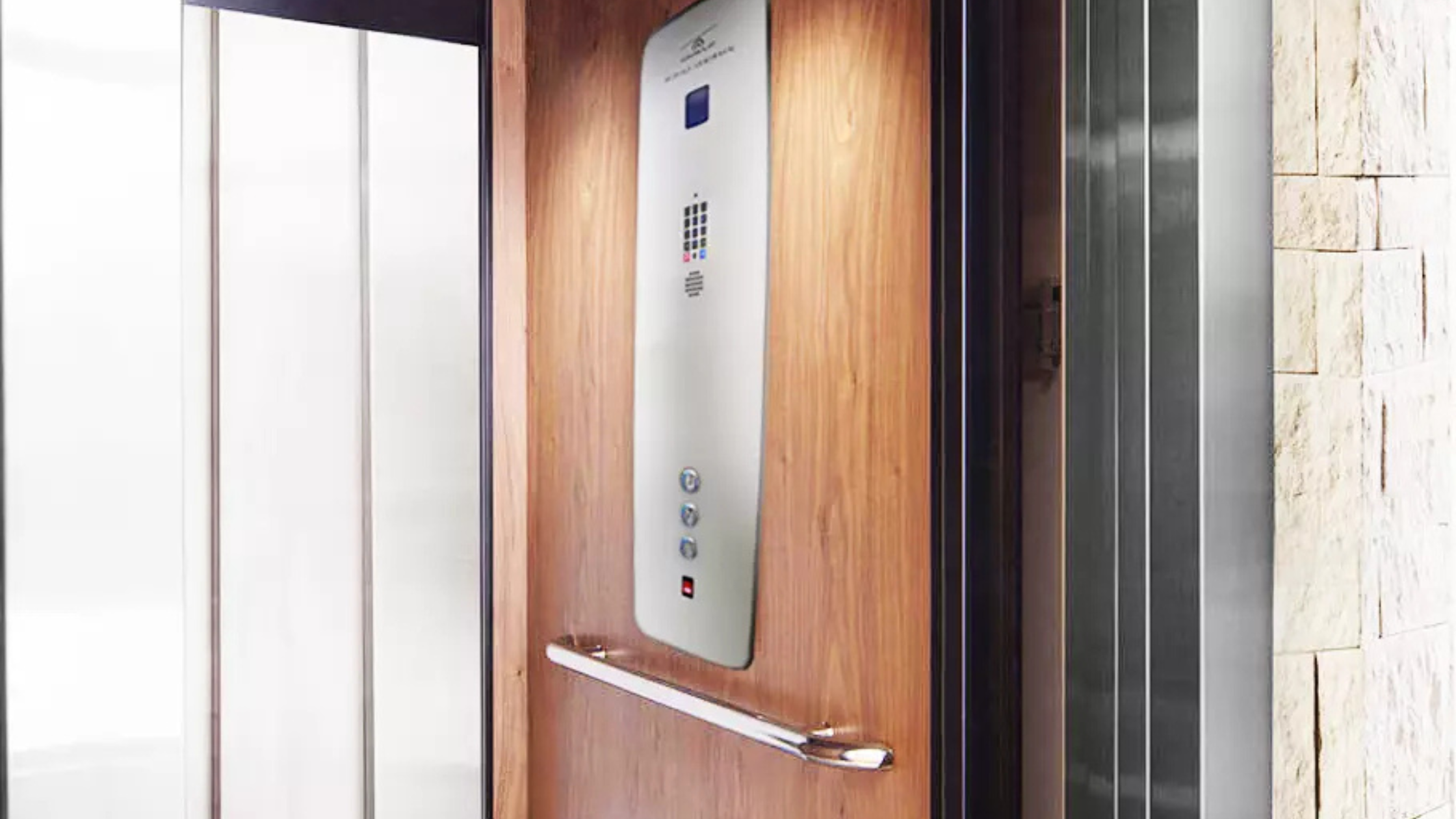 An Elvoron home elevator cab and control panel, illustrating the manual lowering and battery backup safety systems used during a power outage