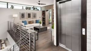 A homeowner and a licensed Texas elevator contractor reviewing a home elevator installation contract together in North Texas